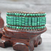 Bracciale a busta in malachite con margherita - Bracciale