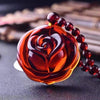 Collier en ambre ’ la rose éternelle ’